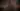 Demonic Figure in Fire-lit Gothic City Square - free dark wallpaper 7680×4313