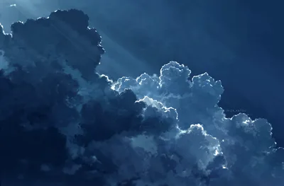 Ethereal Clouds Breaking Through Sunlit Sky - free nature wallpaper 2638×1734