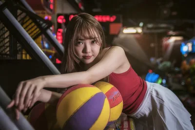 Woman With Volleyball at Night Arcade Setting - free people & portraits wallpaper 5740×3832