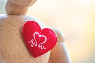 Red Heart with Heartbeat Symbol on Palm - free photography wallpaper 3000×2000