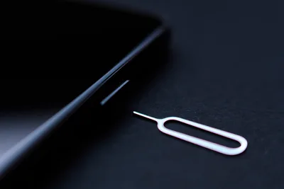 SIM Card Ejector Tool and Device Edge Close-up - free photography wallpaper 6192×4128