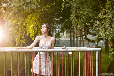 Woman in Floral Dress Leaning on Wooden Railing - free people & portraits wallpaper 5006×3337