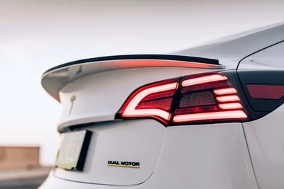 Close-up of White Car's Rear Taillight and Spoiler - free cars & vehicles wallpaper 6720×4480