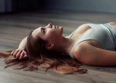 Woman Lying on Wooden Floor in Contemplative Pose - free people & portraits wallpaper 5824×4160