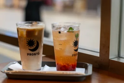 Two Pronto Beverages with Sun and Moon Logo - free food wallpaper 5568×3712
