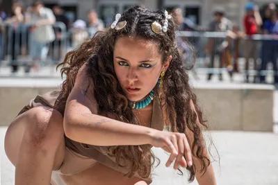 Woman in Tribal-Inspired Costume at Outdoor Event - free people & portraits wallpaper 5740×3827