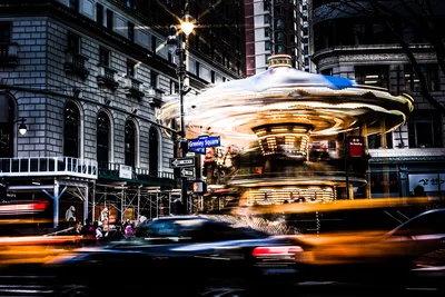 Greeley Square Carousel in Motion at Night - free city & urban wallpaper 5120×3413