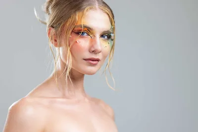 Portrait of Woman With Artistic Face Paint and Updo - free wallpaper 3000×2001