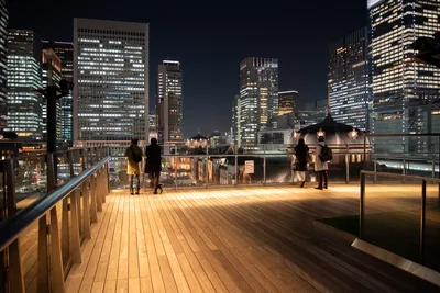 Rooftop Deck Overlooking Illuminated City Skyline at Night - free city & urban wallpaper 6016×4016