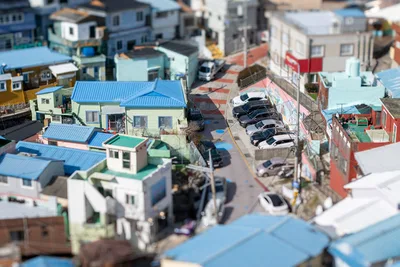 Aerial Tilt-Shift View of Colorful Coastal Neighborhood - free city & urban wallpaper 5568×3712