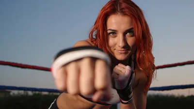 Woman With Red Hair Punching In Boxing Ring - free people & portraits wallpaper 3840×2160