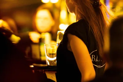 Woman Holding Drink Glass at Evening Celebration - free people & portraits wallpaper 6000×4000