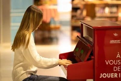Woman Using Red Airport Interactive Kiosk Terminal - free people & portraits wallpaper 6000×4000