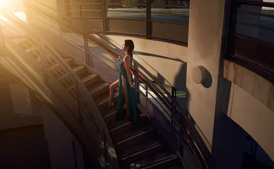 Woman on Stairwell in Golden Sunlight - free wallpaper 4766×2952