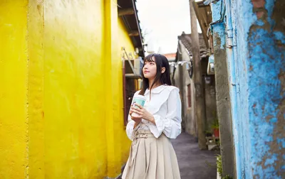 Woman in White Blouse Standing in Colorful Alley - free people & portraits wallpaper 4908×3092