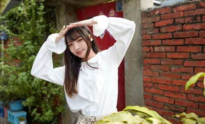 Young Woman In White Shirt By Brick Wall - free people & portraits wallpaper 4799×2911