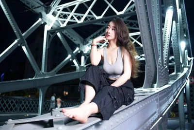 Woman Posing on Industrial Metal Structure at Night - free people & portraits wallpaper 6144×4096