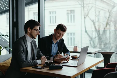Two Businessmen Working Together at Modern Office Desk - free people & portraits wallpaper 3000×2000