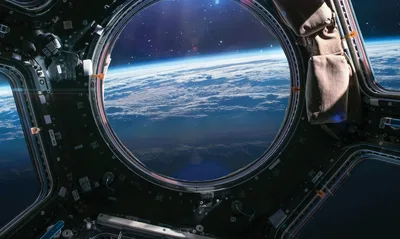 Earth Through the Cupola Window - free space wallpaper 3840×2293