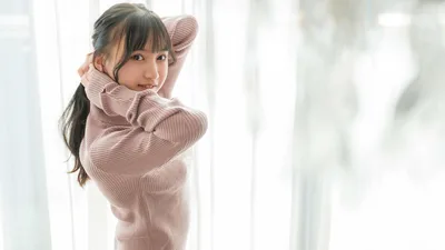 Woman in Pink Ribbed Sweater by Bright Window - free wallpaper 4096×2304