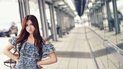 Woman in Blue Floral Dress in Urban Alley - free wallpaper 5760×3240