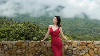 Woman in Red Dress Overlooking Misty Mountain Valley - free wallpaper 5872×3307