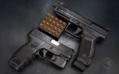 Three Handguns with Ammunition on Dark Surface - free architecture wallpaper 1920×1200