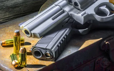Firearms and Ammunition on Rustic Metal Surface - free architecture wallpaper 3840×2400