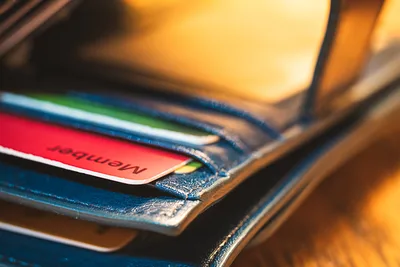Stack of Credit Cards in Warm Leather Wallet - free minimalist wallpaper 3000×2000