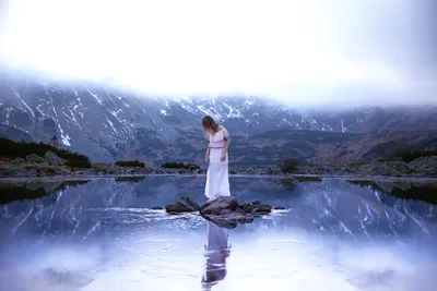Woman in White Dress Standing on Rocks in Mountain Lake - free people & portraits wallpaper 2048×1366
