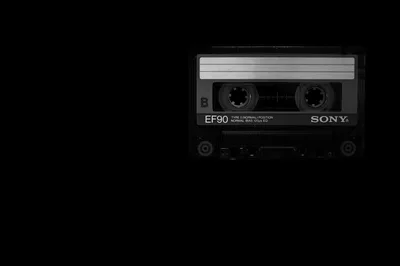 Sony EF90 Cassette Tape on Black Background - free dark wallpaper 6016×4000