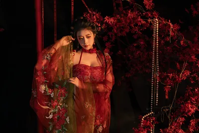 Woman in Red Traditional Dress Among Floral Decorations - free people & portraits wallpaper 9504×6336