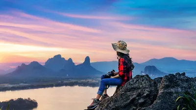 Hiker Sitting on Rocky Outcrop at Sunrise - free people & portraits wallpaper 5752×3236