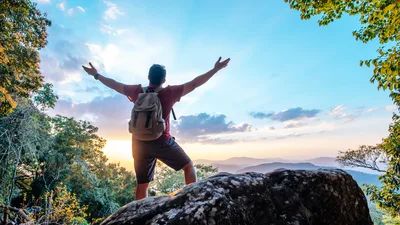 Hiker Celebrating on Mountain Overlook at Sunset - free people & portraits wallpaper 6048×3403