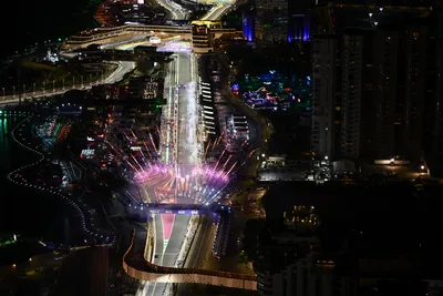 Night Cityscape with Illuminated Street and Racing Circuit - free city & urban wallpaper 5130×3418