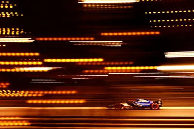 Formula 1 Race Car Speeding Through Illuminated Night Circuit - free cars & vehicles wallpaper 6067×4032