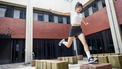 Young Woman Jumping on Urban Concrete Blocks - free people & portraits wallpaper 4816×2709