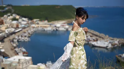 Woman in Patterned Dress Overlooking Coastal Harbor - free people & portraits wallpaper 4892×2752