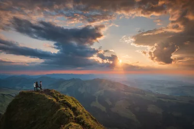 Mountain Summit Sunset with Three Hikers Overlooking Valley - free people & portraits wallpaper 5081×3387