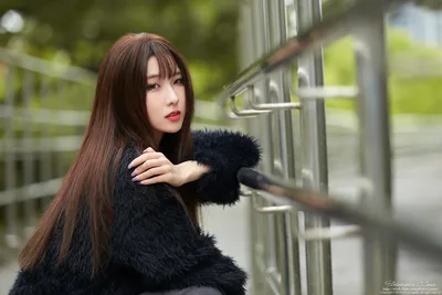 Young Woman in Black Fur Coat by Metal Railing - free people & portraits wallpaper 4572×3048