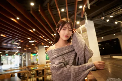 Woman in Gray Sweater at Modern Indoor Venue - free people & portraits wallpaper 4976×3315