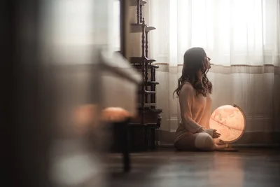 Woman in Room with Glowing Globe and Wooden Shelves - free people & portraits wallpaper 2000×1334