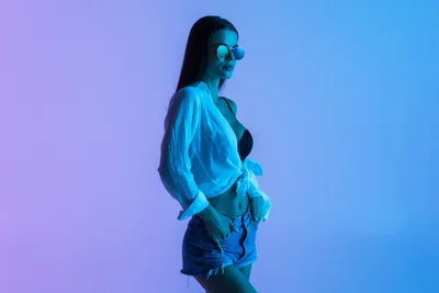 Woman in Blue Lighting with Sunglasses and Casual Wear - free people & portraits wallpaper 6720×4480