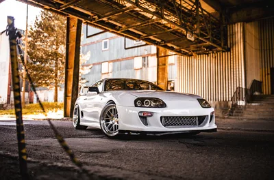 White Sports Car in Industrial Warehouse Setting - free cars & vehicles wallpaper 4096×2700