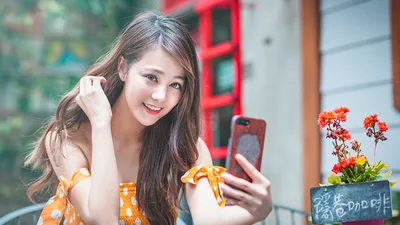 Young Woman Taking Selfie with Red Flowers - free people & portraits wallpaper 5760×3240