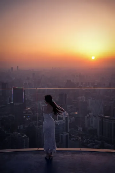 Woman in White Dress at Sunset Over City Skyline - free people & portraits wallpaper 4096×6144