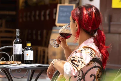 Woman with Red Hair Tasting Wine at Outdoor Table - free people & portraits wallpaper 6000×4000