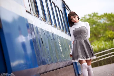 Young Woman Posing by Blue and White Boat - free people & portraits wallpaper 4943×3295