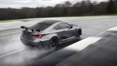 High-Performance Sports Car Drifting on Wet Track - free cars & vehicles wallpaper 4096×2304