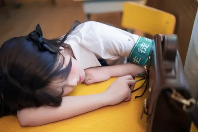 Girl Resting on Yellow Chair with Book - free people & portraits wallpaper 5472×3648